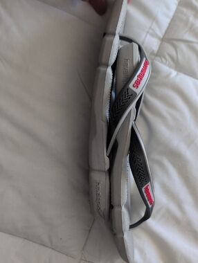 Havaianas Gray and Black Flip Flops with Pink Logo Accent